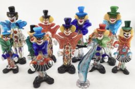 A collection of eleven Murano style brown glass figures of clowns various sizes