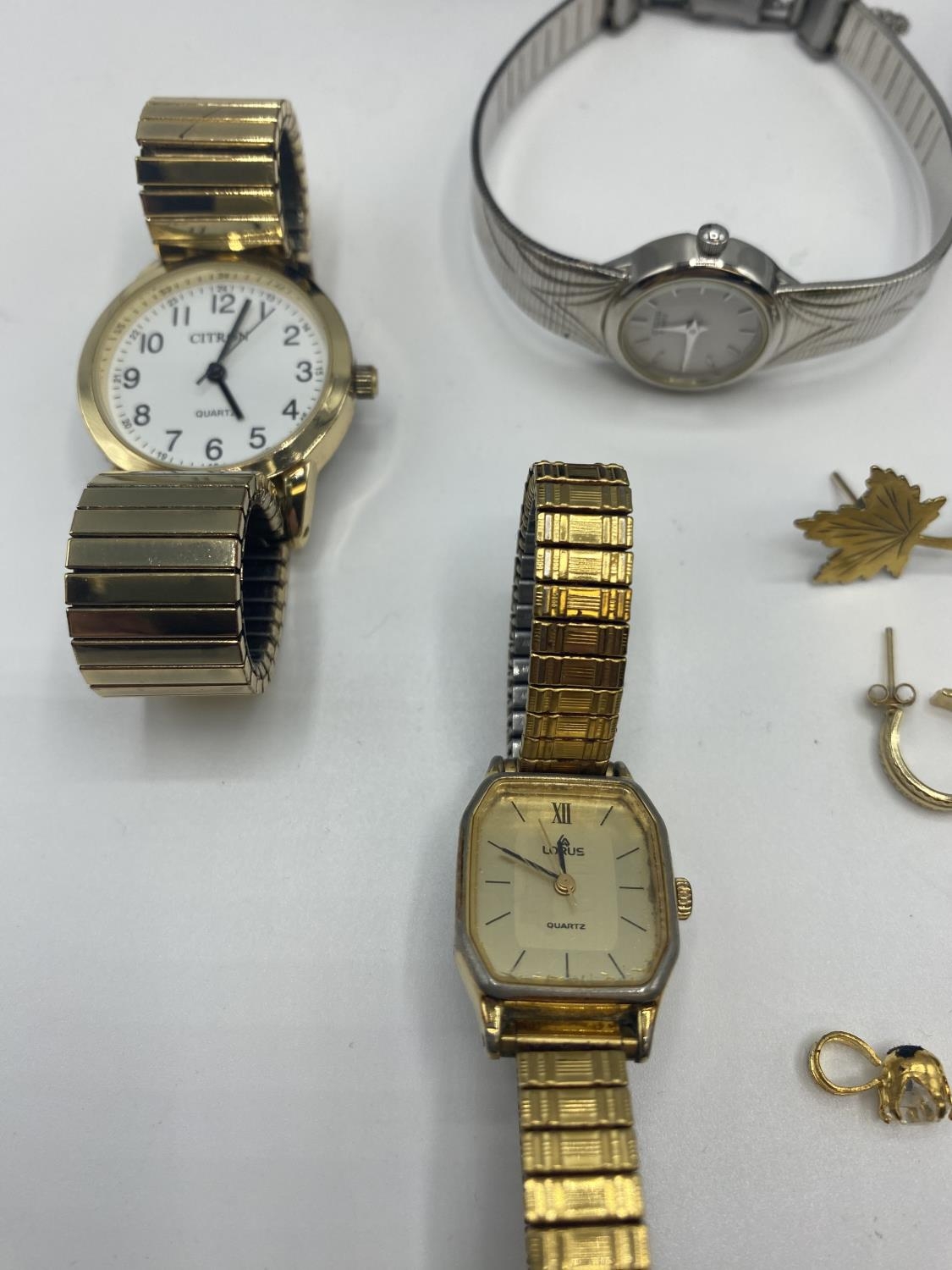 A collection of unmarked yellow metal jewellery together with some high street fashion watches. - Image 4 of 5