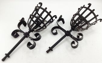 A pair of wrought iron basket wall sconces, 49cm