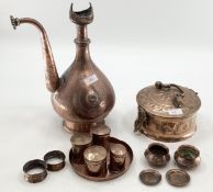 Two items of South Asian copper work, to include a tea pot and spice container