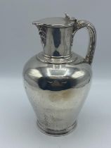 Sterling silver lidded jug, on circular stepped foot, by John Wilmin Figg, London, 1837, 21.5otz