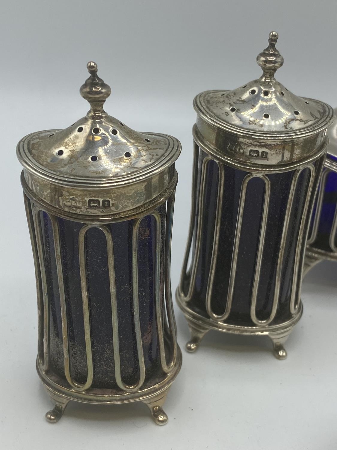 A collection of sterling silver table items to include a pair of Adams Style Pepperets, A pepper - Image 3 of 6