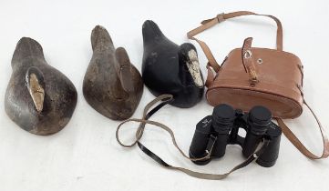 Three decoy ducks and a pair of cased binoculars by Karl Heitz