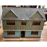 A vintage dolls house, fitted interior and some furniture 62 x 80