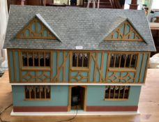 A vintage dolls house, fitted interior and some furniture 62 x 80