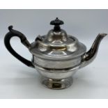 A Sterling Silver bachelors teapot .