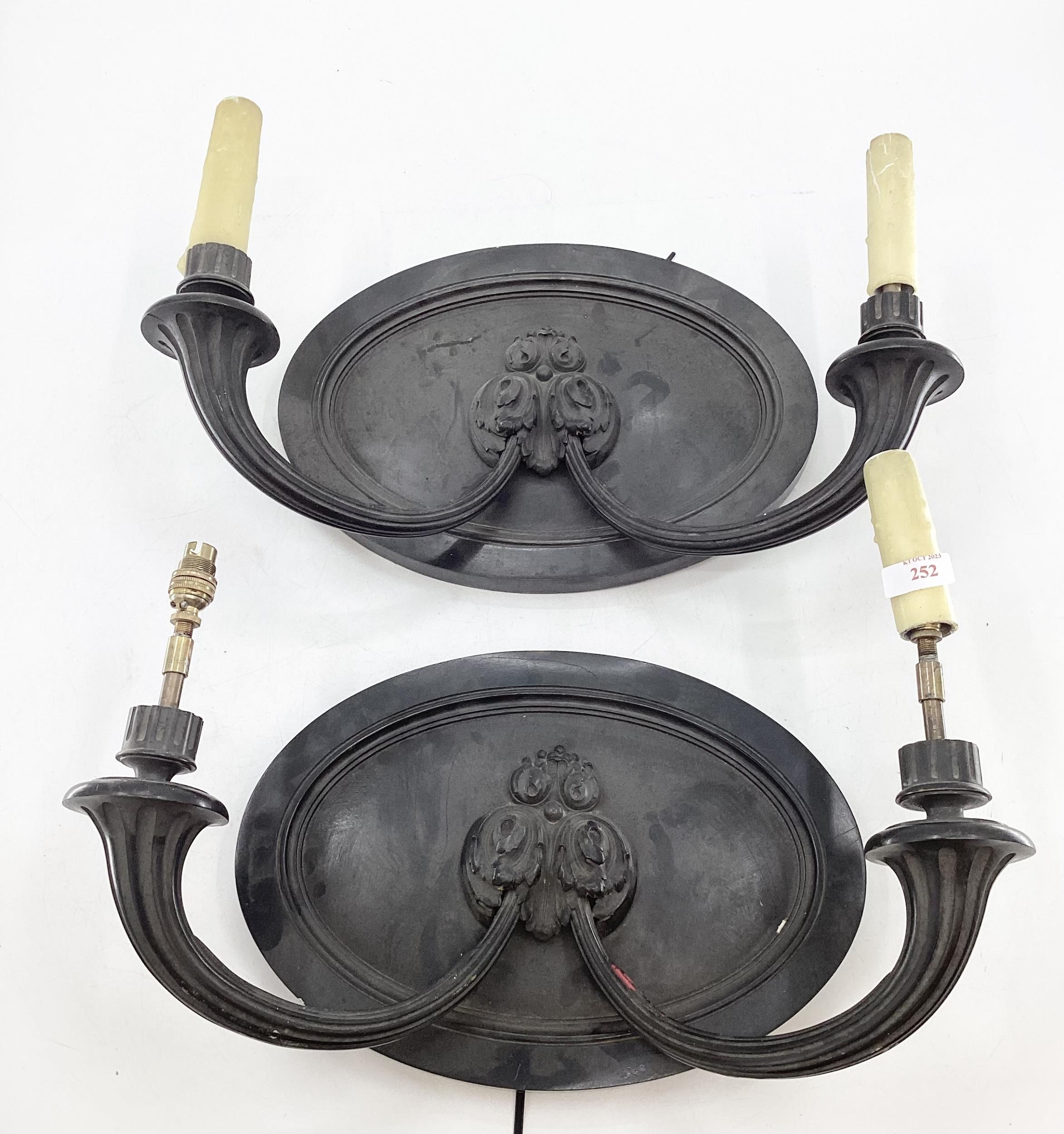 A pair of French C19th Bronze two branch wall sconces, converted to electricity, 45cmW