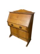 Good quality Art Nouveau style honey coloured oak, students writing bureau with fitted interior