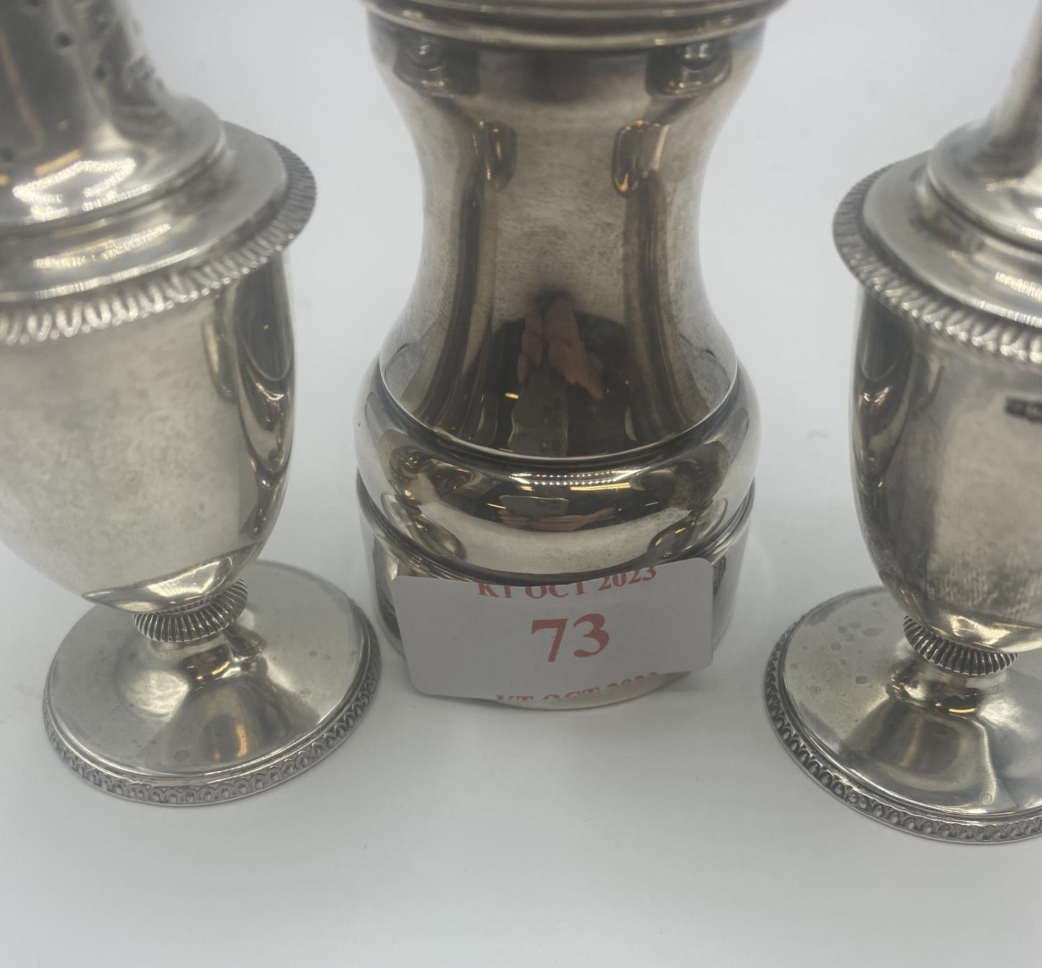 A pair of Adam style pepperettes together with a sterling silver pepper grinder. - Image 6 of 6