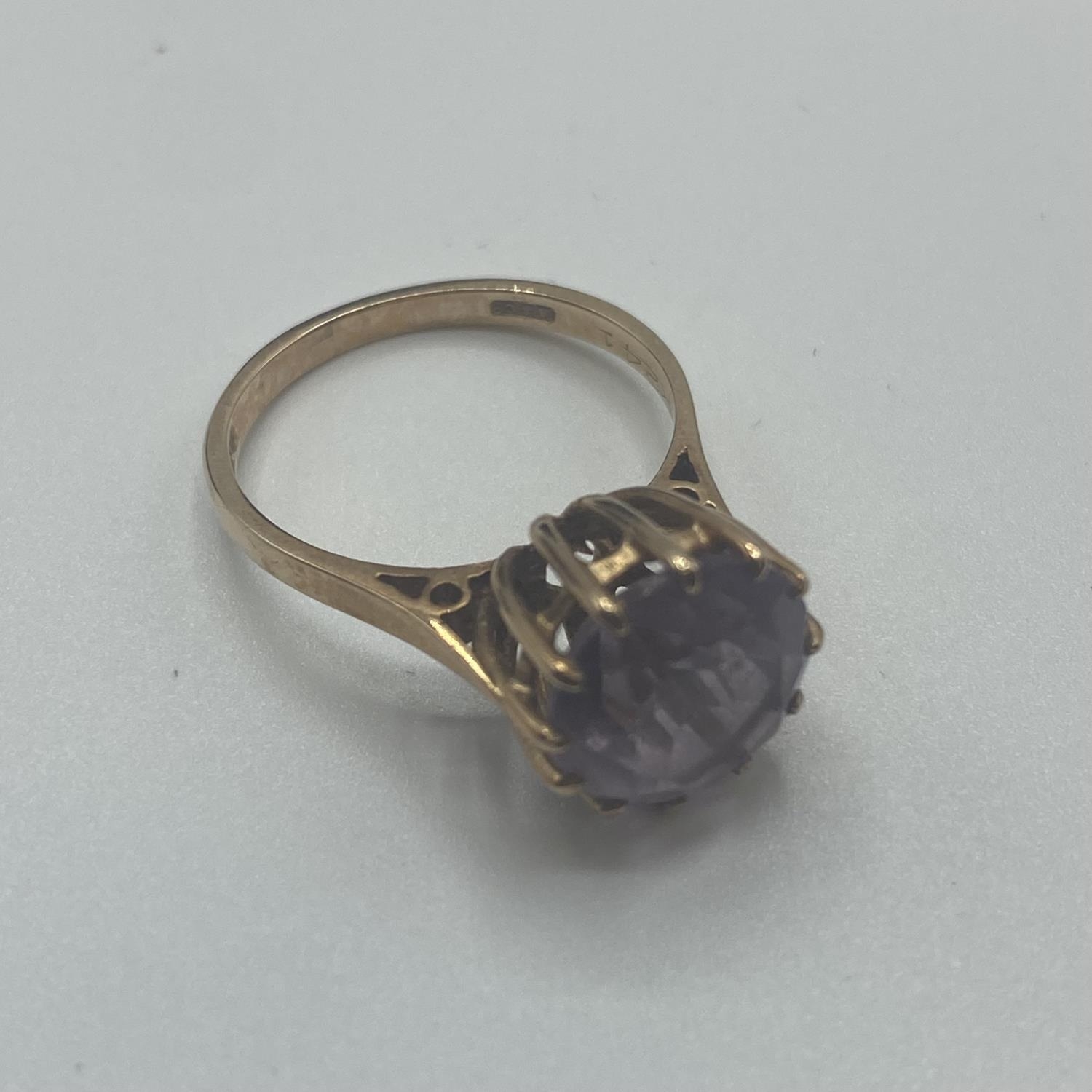 A 9ct gold and amethyst single stone ring, circular round cut Amethyst in a 12 claw setting, 2.8g - Image 4 of 4