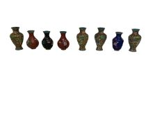 A set of eight miniature cloisonne bottles, in presentation box