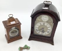 Mahogany bracket clock, Arched face with silvered dial and gilt spandrels, retailed by Liberty of