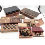 A collection of boxes, chess sets, backgammon et
