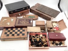 A collection of boxes, chess sets, backgammon et