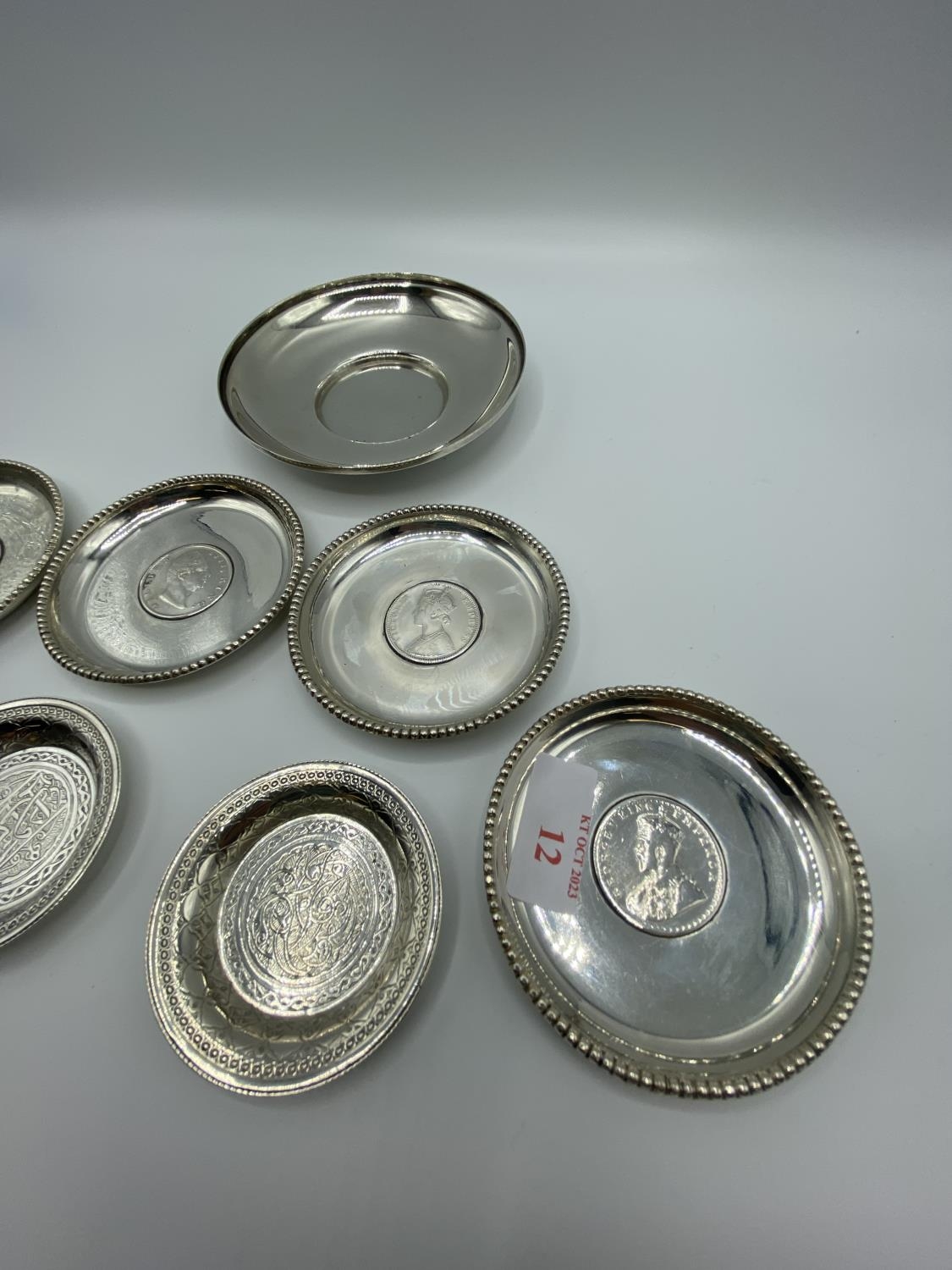 A set of 4 silver coin set pin dishes and a sterling silver example and 2 unmarked white metal - Image 3 of 10