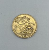 A 1911 gold sovereign. 7.9g.
