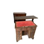 A red leather top desk and other general furniture to clear