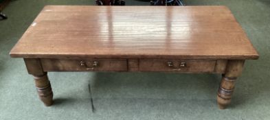 A modern oak coffee table with two drawers. 132cm (w)