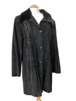 Leather and mink trimmed coat by Ruffo