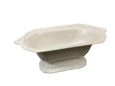 A white, heavy cast iron planter, 61 x 33cm