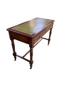 Rectangular leather topped writing desk with two drawers on stretcher base to castors 106 cm W x
