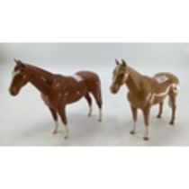 Two Beswick chestnut models of horses, each approx 25 x 21cm