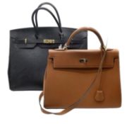 A large black ladies handbag, very minor wear, and a brown ladies leather handbag with shoulder