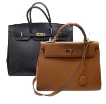 A large black ladies handbag, very minor wear, and a brown ladies leather handbag with shoulder