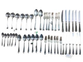 A six person sterling silver flatware service together with sterling silver handled knives .