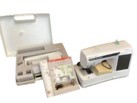 A HUSQVARNA Viking electric sewing machine.