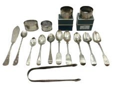 A Collection (15 items) of sterling silver items to include napkin rings spoons, sugar tongs etc.