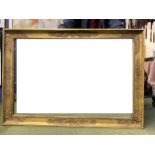 A large C19th gilt framed rectangular wall mirror 124 cm x 88 cm