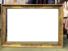 A large C19th gilt framed rectangular wall mirror 124 cm x 88 cm