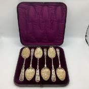 A boxed set of 19th century unmarked white metal strawberry spoons. 510g.