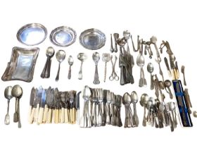 A collection of silver plated flatware and other items