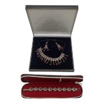 A suite of South Asian style white metal jewellery, ruby, emerald and diamond set, bracelet 21 cm,