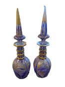 A large matched pair of bohemian style decorative gilt and blue glass decorative perfumes 55 cm H