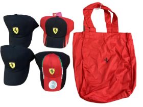 A collection of Ferrari Formula 1 memorabilia to include 4 caps, most with original tags and a