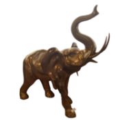 A large Brass coloured Elephant.