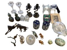 A mixed lot of collectables to include candlesticks, models of grey hounds and birds, and a glass