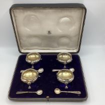 A boxed set of sterling silver salts by Robert Harper, London 1865. 302g approx.