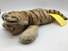 A Steiff Tiger soft toy, with button to ear, 40cm Long