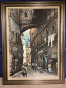 A modern decorative wooden framed picture of a Continental street scene 68 x 48c