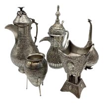 A collection of Middle eastern silver and white metal items to include a coffee pot, rose water