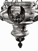 A C19th Censor or Thurible , depicting cherubs, inscription to base, white metal