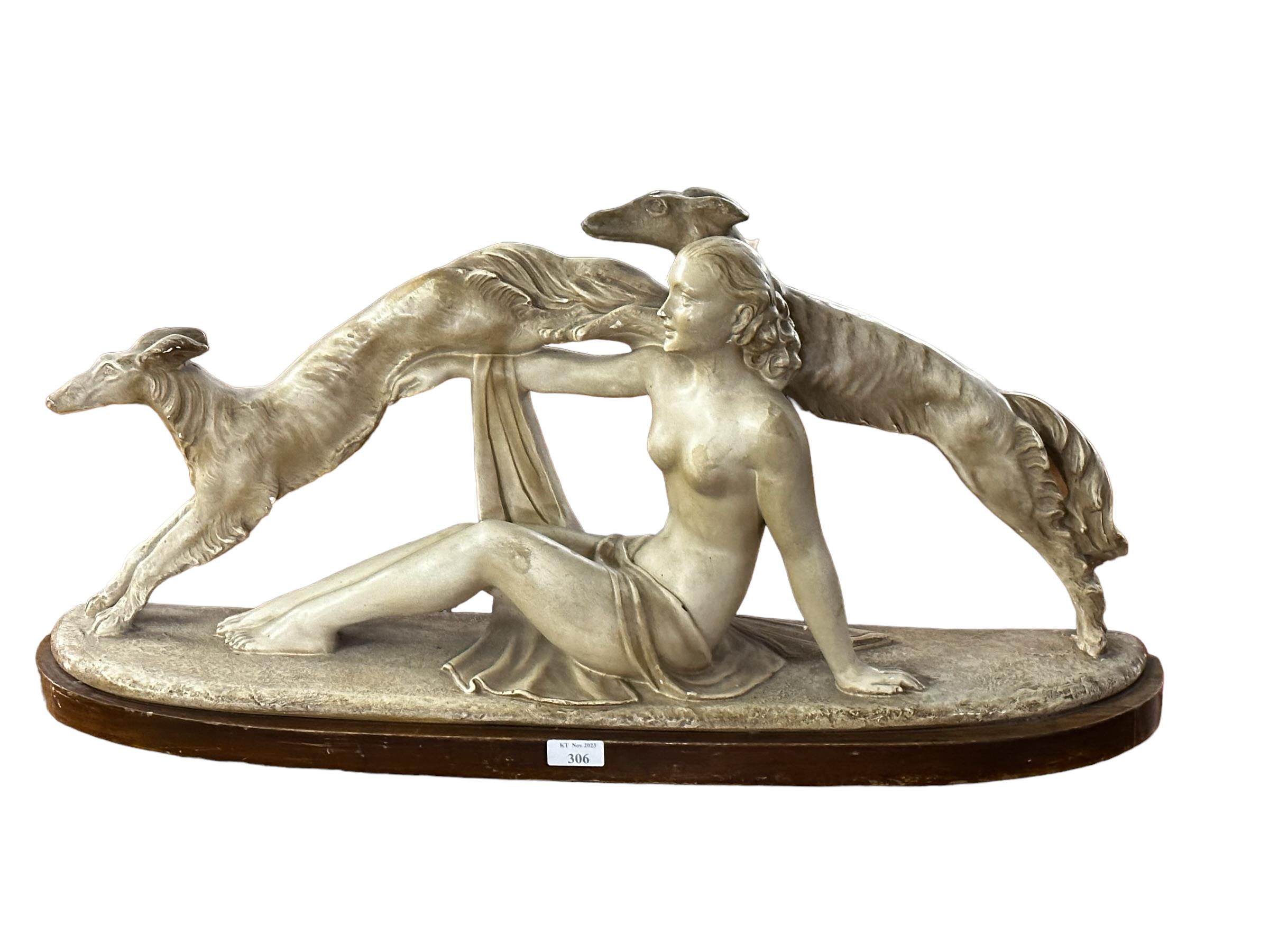 A modern composite statue of a reclining female nude, with two lurcher/hounds, as found with some - Image 3 of 3