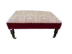 Rectangular upholstered stool on mahogany turned legs with brass castors 94 cm W x 64 cm D x 45 cm H