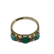 An 18ct gold turquoise and diamond ring. Three oval turquoise cabochons with old cut diamond