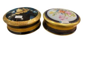 Two Limoges gilt circular ceramic lidded pots one marked to base Limoges Castel France, the other