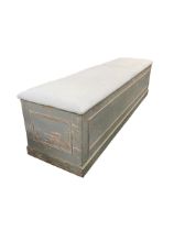 Large painted 'coffin' box with upholstered lid. 202 cm L x 53 cm D x 54 cm H